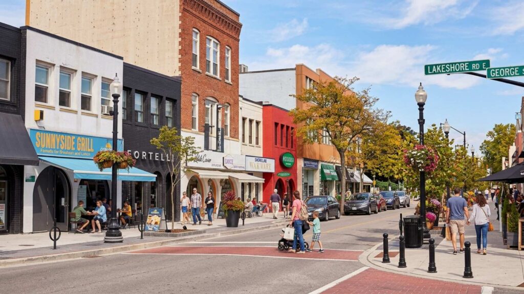 Historic street view of Lakeshore Road with shops and cafés in Downtown Oakville.
